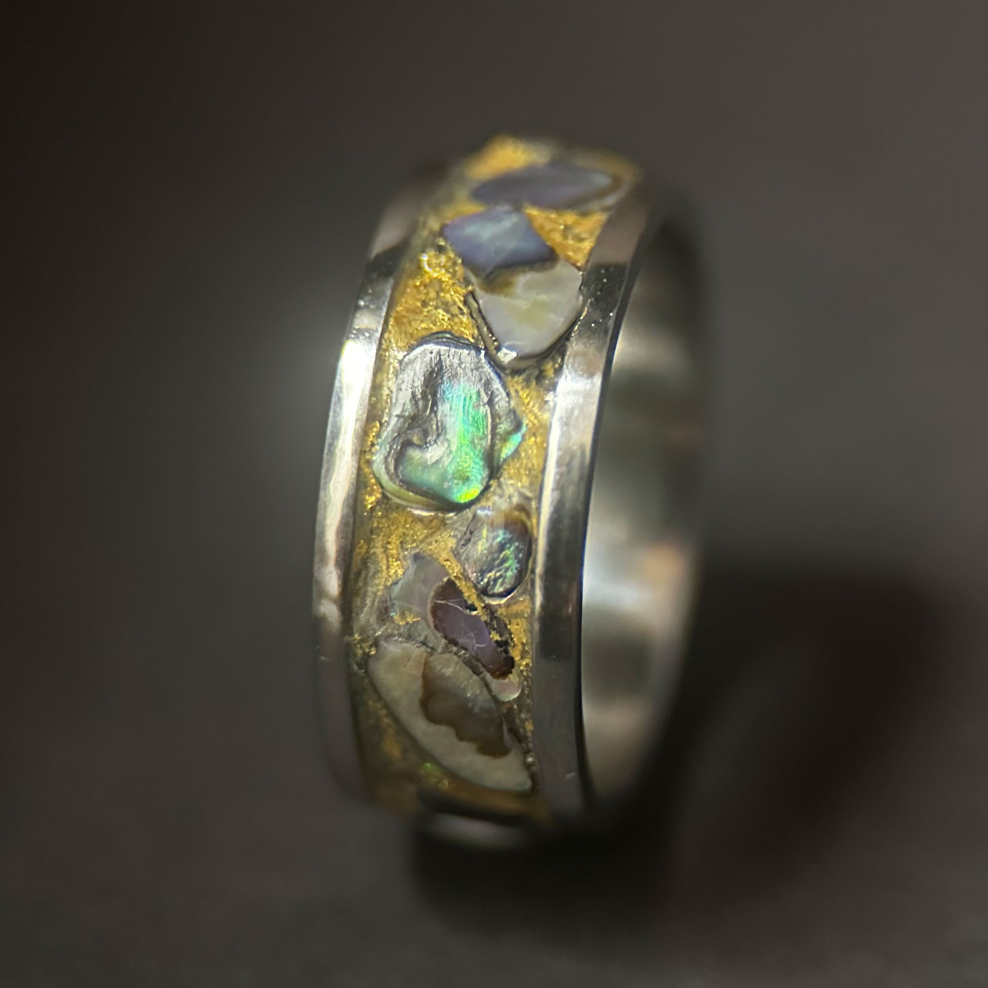 Abalone ring with golden sand and tungsten core.