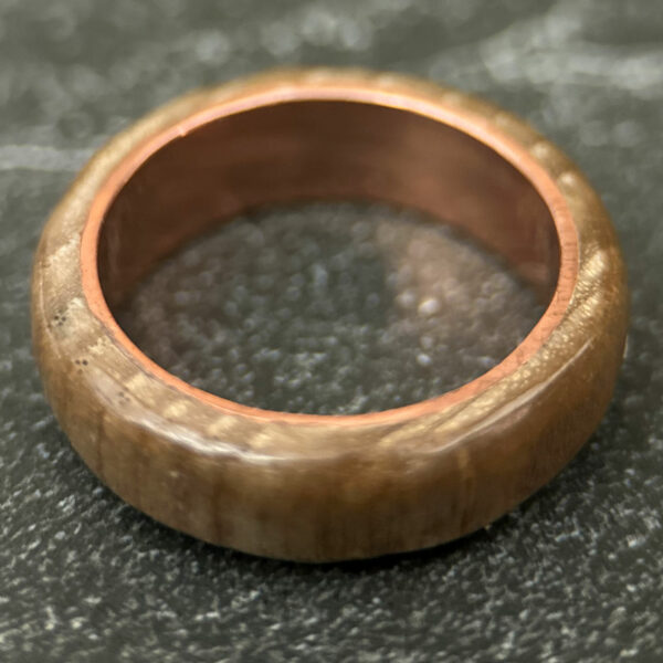 Cherry and copper pipe ring.