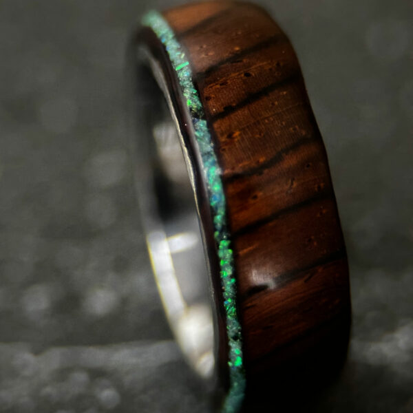 Fractured wood ring with cocobolo wood and mint green opal inlay.