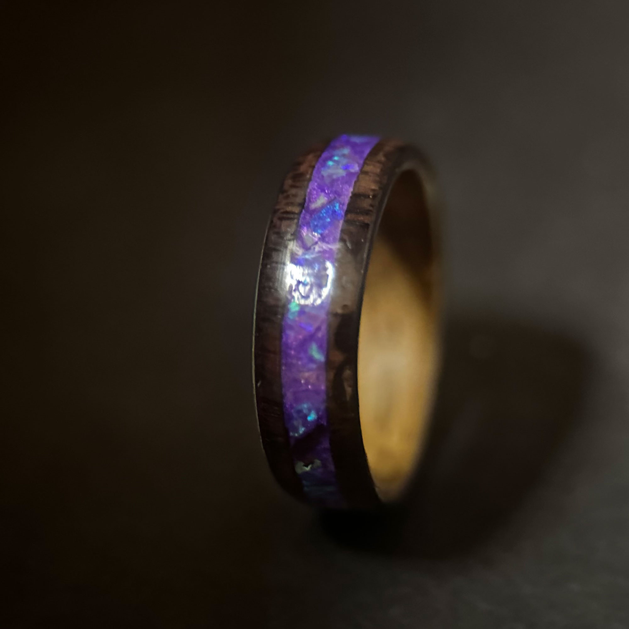 Indian rose wood ring with wooden liner and purple inlay.