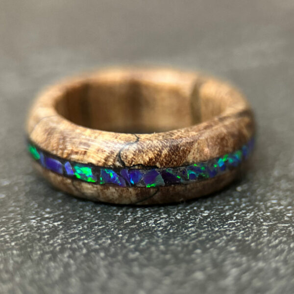 Spalted Maple wood ring with green and purple opal inlay.