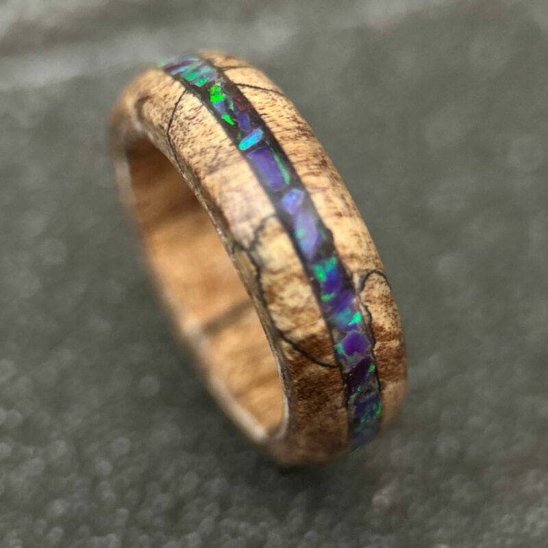 Spalted Maple wood ring with purple and green opal inlay.