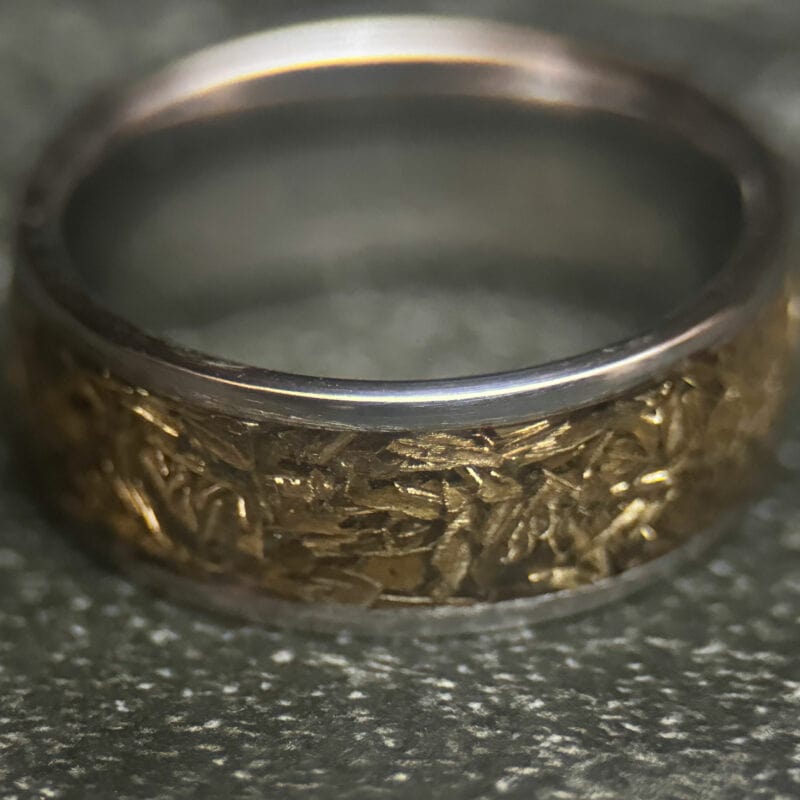Stainless steel ring with tank inlay.