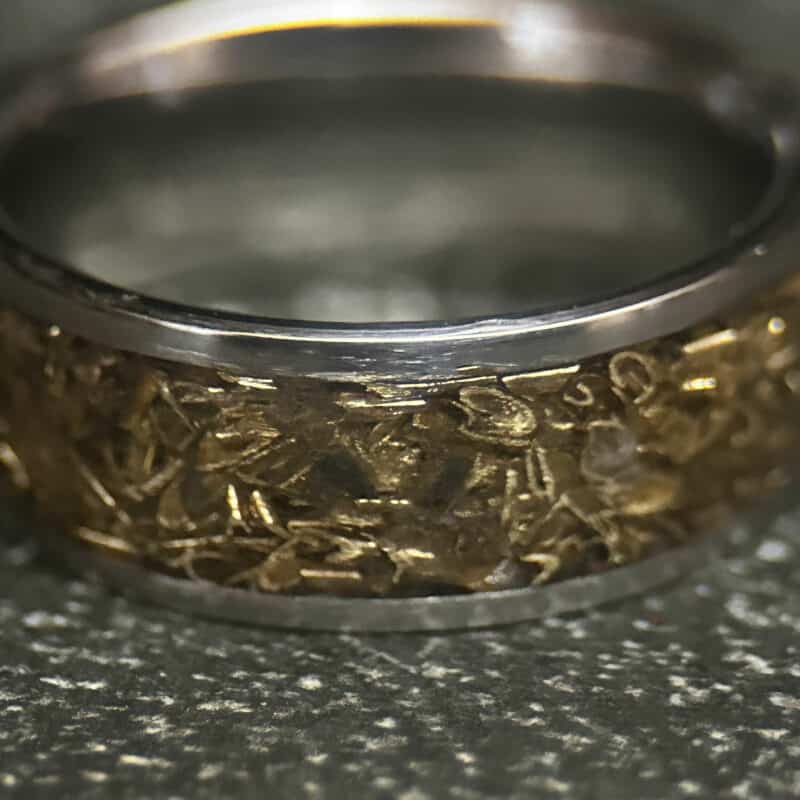 Stainless steel ring with tank inlay.