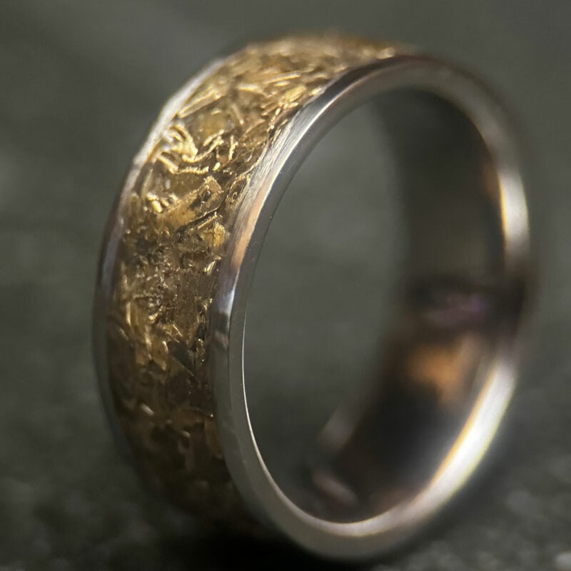 Stainless steel ring with tank inlay.