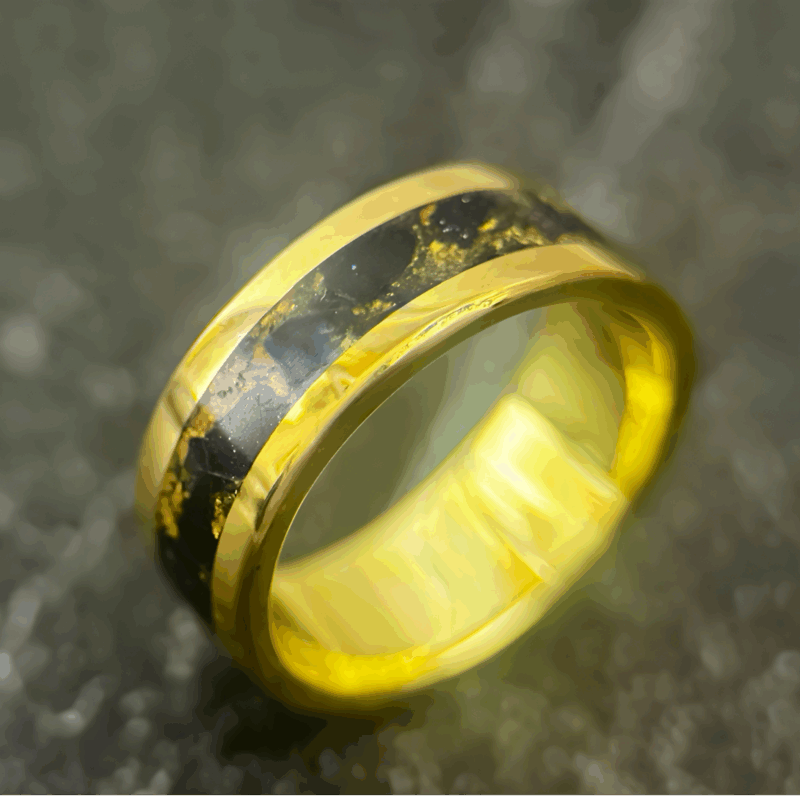 Nordic gold ring with blue gold stone inlay.