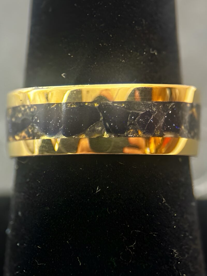 Nordic gold ring with blue gold stone inlay.