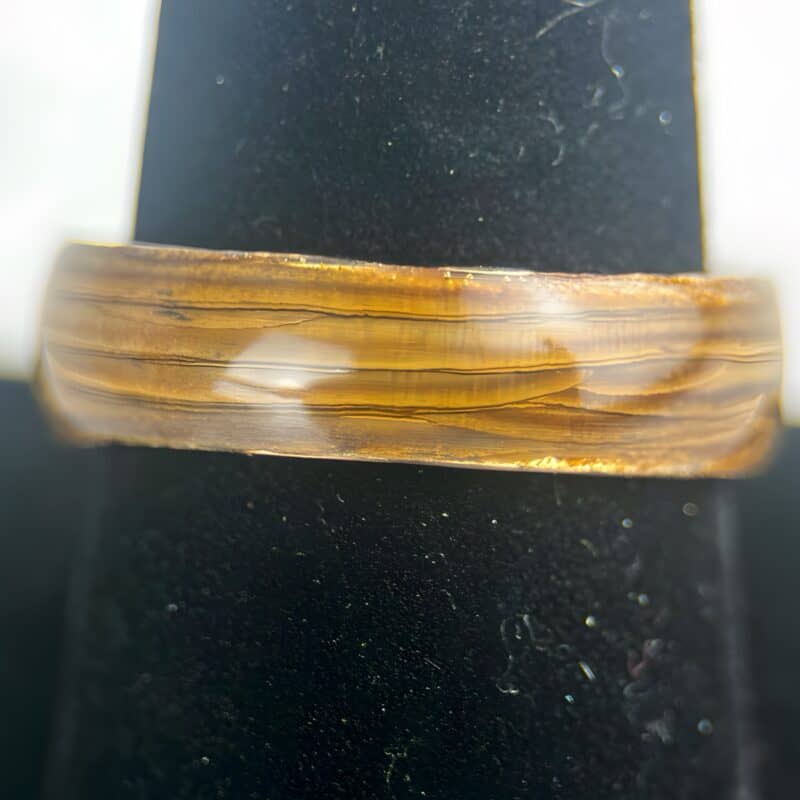 Driftwood copper ring on ring stand.
