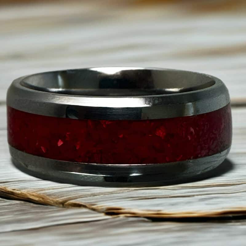 Red coral stone ring with tungsten comfort core.