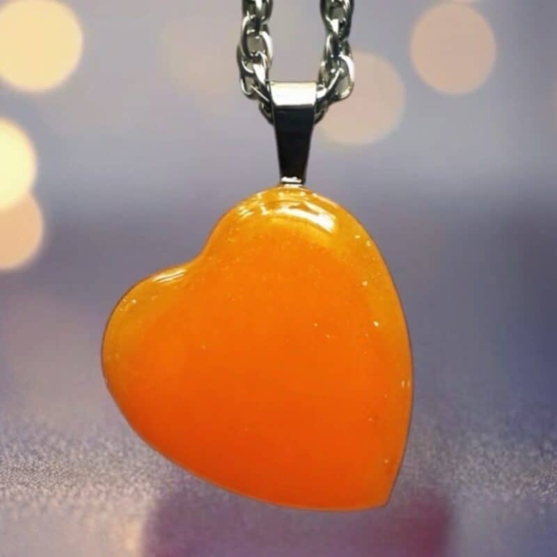 Glow in the dark heart pendant necklace.
