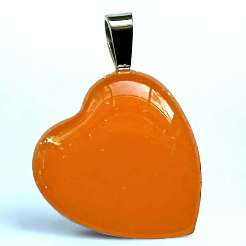 Glow in the dark heart pendant necklace.