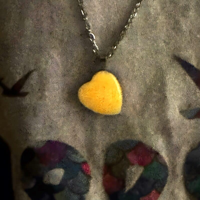 Glow in the dark heart pendant necklace.