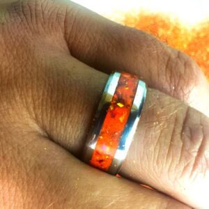 The Showgirl, orange ring with opal and mica powder.