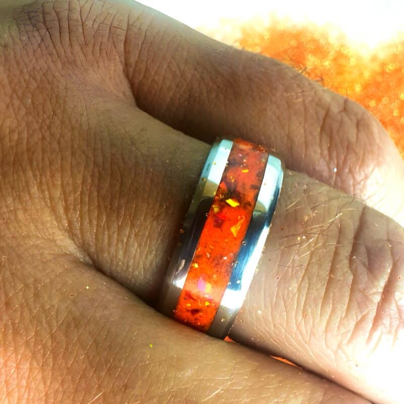 The Showgirl, orange ring with opal and mica powder.