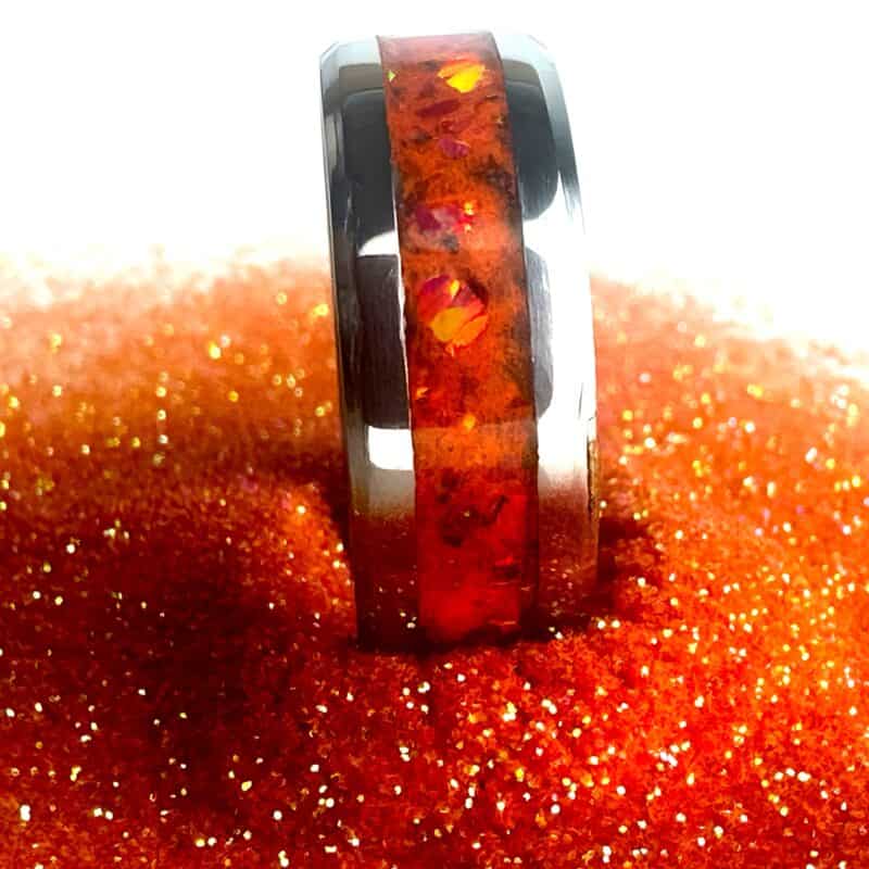 The Showgirl, orange ring, shown in orange glitter.