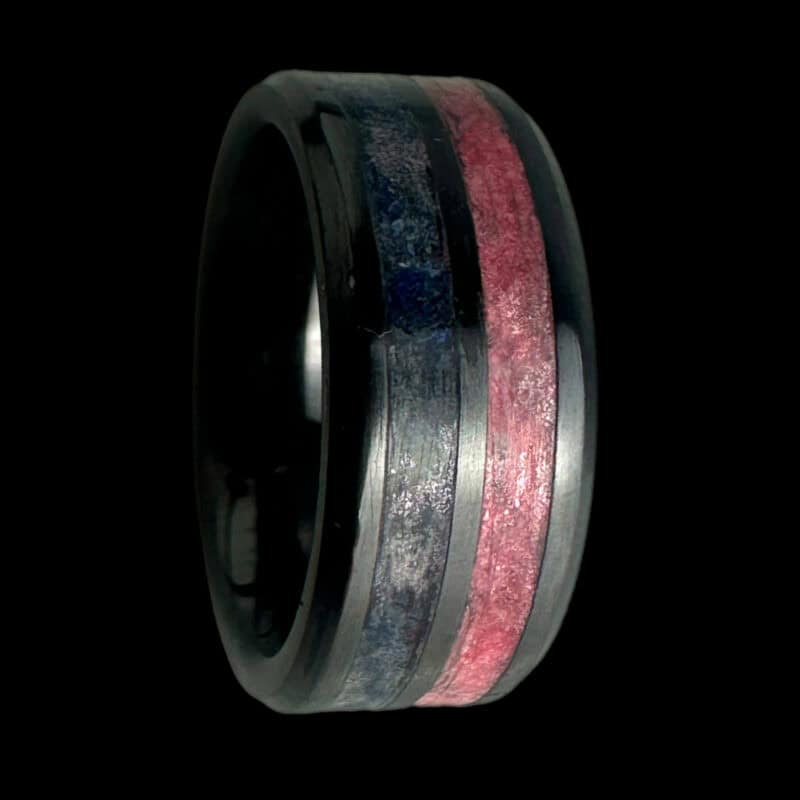 Pregnancy and infant loss awareness ring. Black ceramic duel channel comfort core with pink and blue inlays.