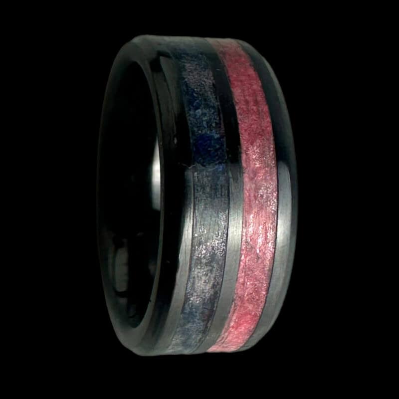Pregnancy and infant loss awareness ring. Black ceramic duel channel comfort core with pink and blue inlays.
