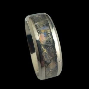 Opalite ring on a neutral background, available in several US sizes.