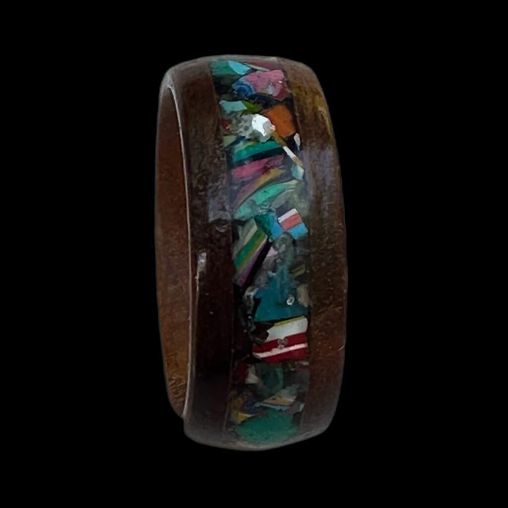 Koa ring with crushed surfboard inlay.